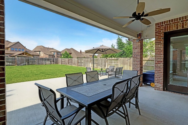 19222 Bullard Creek Dr, Cypress, TX 77433 - fenced backyard featuring ceiling fan, a patio, outdoor dining space, and a residential view