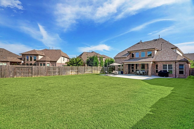 19222 Bullard Creek Dr, Cypress, TX 77433 - fenced backyard with a patio area