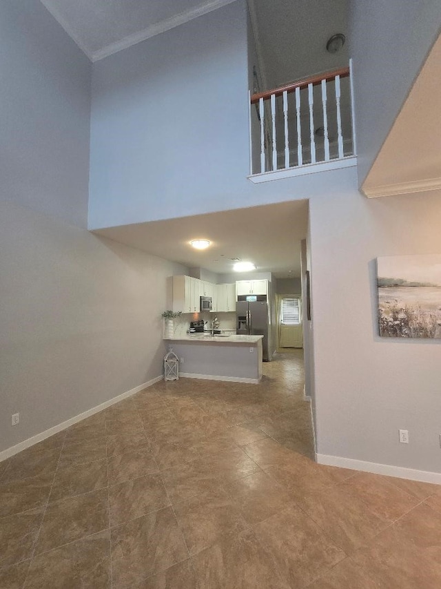 176 Capetown, Conroe, TX 77356 - living room with ornamental molding and a high ceiling