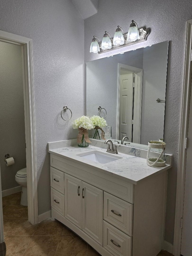 176 Capetown, Conroe, TX 77356 - bathroom with vanity and tile patterned flooring