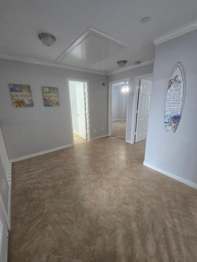 176 Capetown, Conroe, TX 77356 - unfurnished room with attic access and crown molding