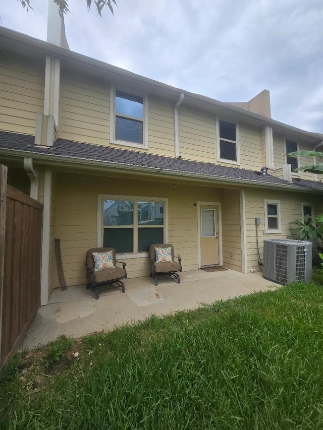 176 Capetown, Conroe, TX 77356 - back of house featuring a patio