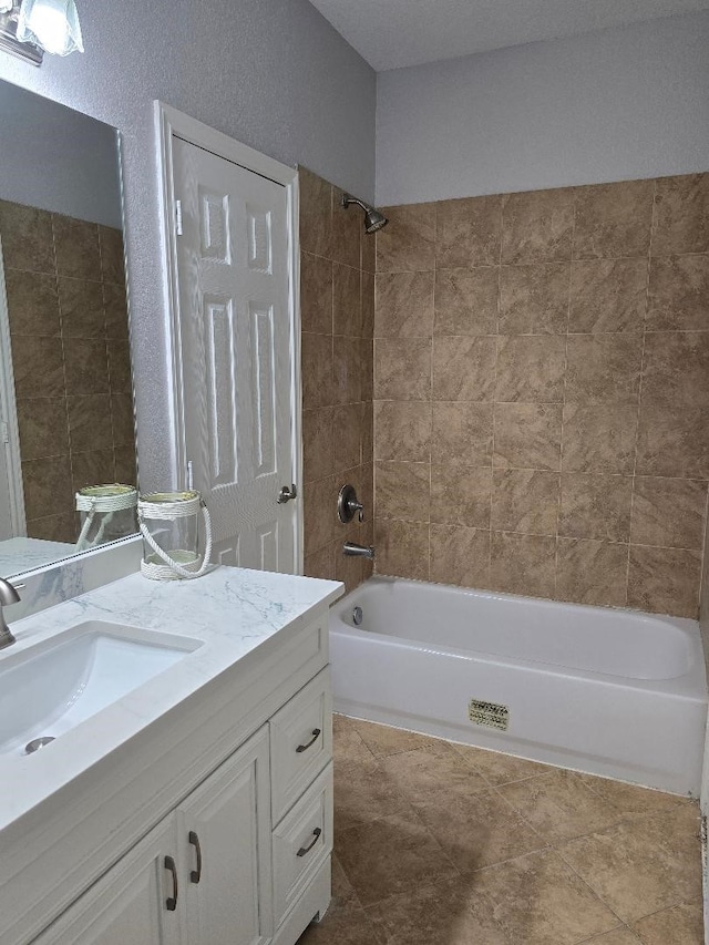 176 Capetown, Conroe, TX 77356 - full bathroom featuring vanity and shower / bathtub combination