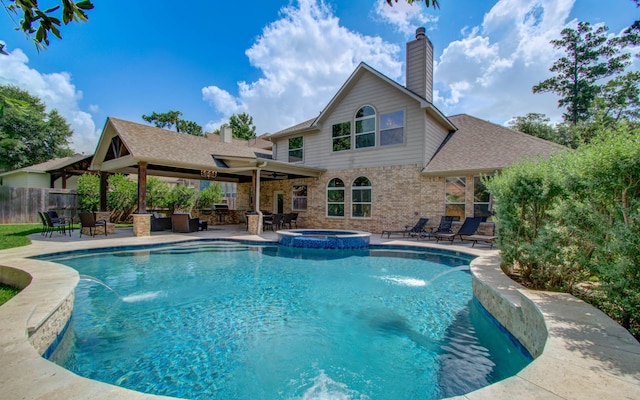 2512 Eagle Post Dr, Conroe, TX 77304 - view of pool featuring a patio and a pool with connected hot tub
