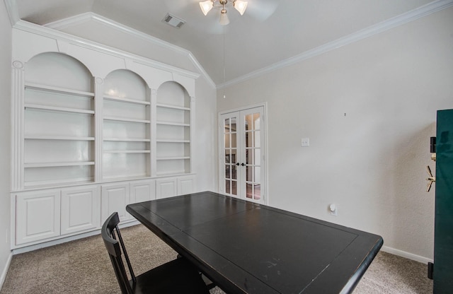 2512 Eagle Post Dr, Conroe, TX 77304 - carpeted home office with french doors, lofted ceiling, crown molding, a ceiling fan, and built in shelves