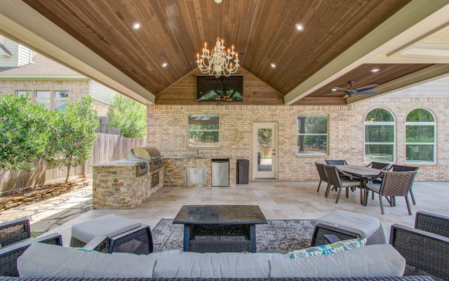 2512 Eagle Post Dr, Conroe, TX 77304 - view of patio / terrace with an outdoor kitchen, an outdoor hangout area, ceiling fan, and outdoor dining area