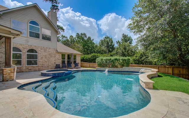 2512 Eagle Post Dr, Conroe, TX 77304 - view of pool featuring a fenced backyard, a patio area, and a pool with connected hot tub