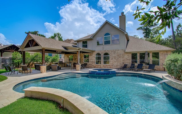 2512 Eagle Post Dr, Conroe, TX 77304 - view of pool featuring a patio area, a pool with connected hot tub, and a gazebo
