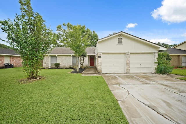 411 Pickford Dr, Katy, TX 77450 - ranch-style house with a garage, driveway, a front lawn, brick siding, and a shingled roof