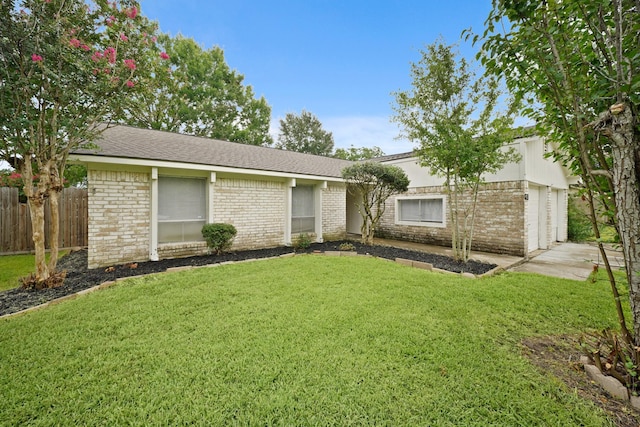 411 Pickford Dr, Katy, TX 77450 - single story home with brick siding, concrete driveway, an attached garage, and a shingled roof