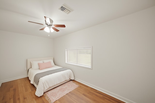 411 Pickford Dr, Katy, TX 77450 - bedroom featuring wood finished floors and ceiling fan