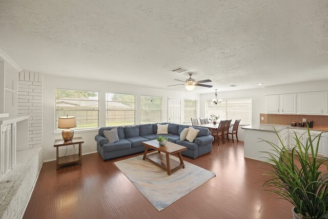 411 Pickford Dr, Katy, TX 77450 - living area with a textured ceiling, wood finished floors, and ceiling fan