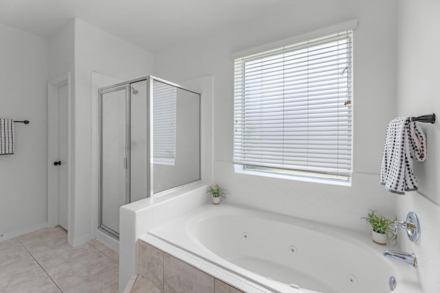 5918 Mahogany Way, Magnolia, TX 77354 - bathroom featuring a stall shower, a tub with jets, healthy amount of natural light, and tile patterned floors
