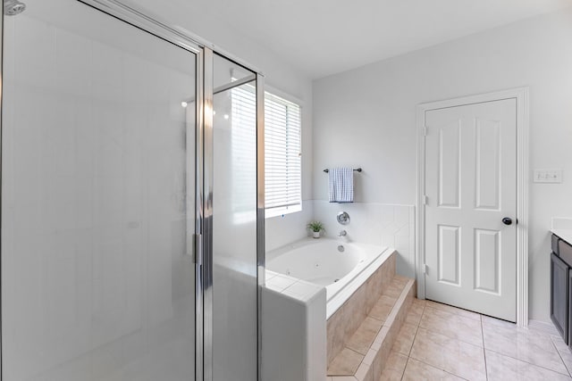 5918 Mahogany Way, Magnolia, TX 77354 - full bath with a stall shower, vanity, a jetted tub, and tile patterned flooring