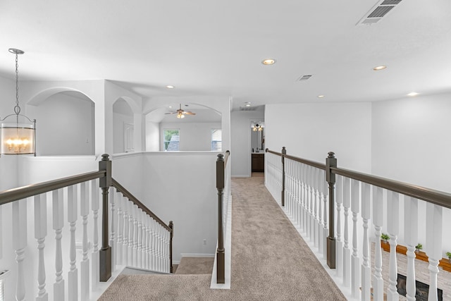 5918 Mahogany Way, Magnolia, TX 77354 - hall featuring an upstairs landing, carpet flooring, recessed lighting, and a chandelier
