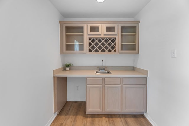5918 Mahogany Way, Magnolia, TX 77354 - indoor wet bar featuring light wood-style flooring and baseboards