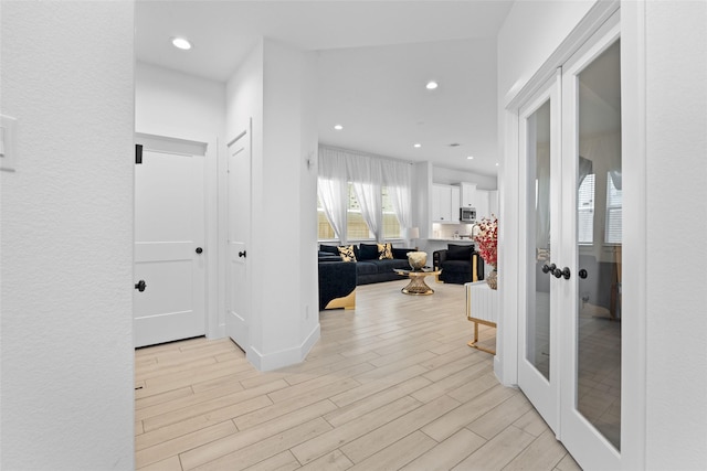 17735 Tree Of Heaven, Conroe, TX 77385 - hall featuring light wood-style flooring, french doors, and recessed lighting