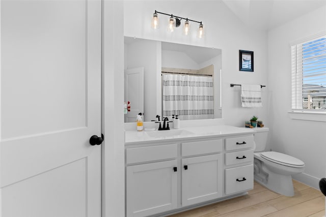 17735 Tree Of Heaven, Conroe, TX 77385 - bathroom with vanity, wood finished floors, and a shower with shower curtain