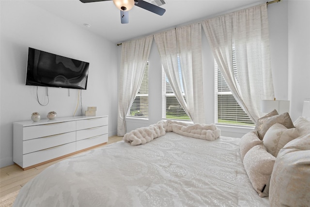 17735 Tree Of Heaven, Conroe, TX 77385 - bedroom featuring light wood-style floors and a ceiling fan