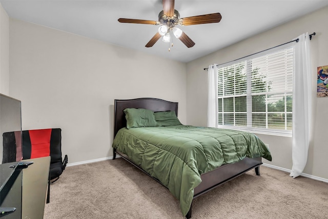 4714 Rumbling Canyon Ct, Katy, TX 77449 - carpeted bedroom featuring baseboards and ceiling fan