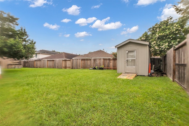 4714 Rumbling Canyon Ct, Katy, TX 77449 - fenced backyard featuring a storage unit