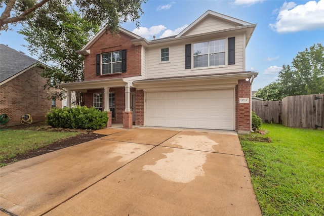 4714 Rumbling Canyon Ct, Katy, TX 77449 - view of front of property featuring brick siding, an attached garage, driveway, and covered porch