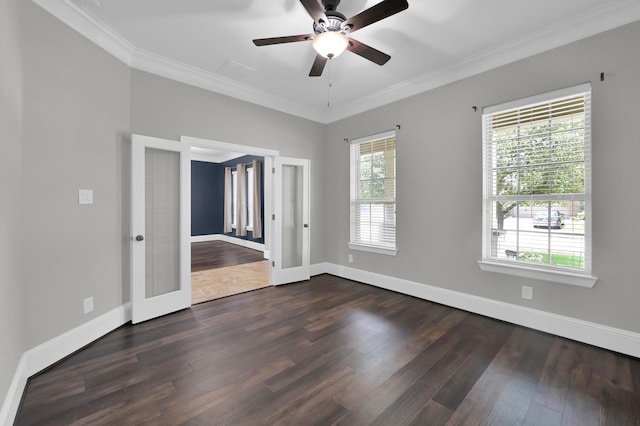 18618 Bridle Grove Ct, Tomball, TX 77377 - spare room featuring french doors, dark wood-style flooring, a ceiling fan, and ornamental molding