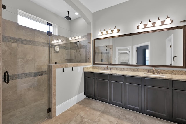 18618 Bridle Grove Ct, Tomball, TX 77377 - bathroom with a stall shower, double vanity, and tile patterned flooring