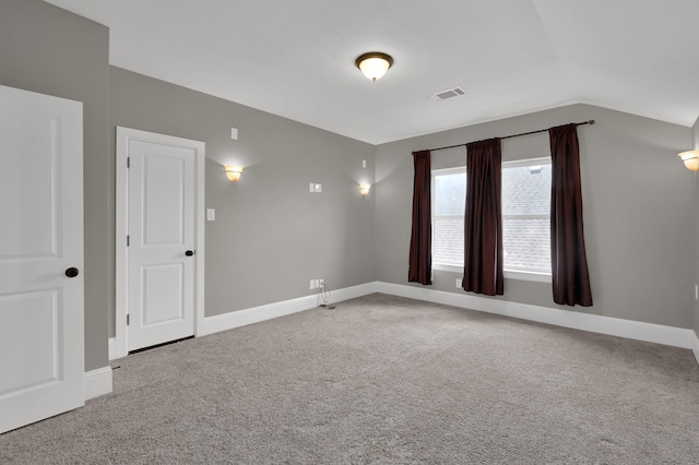 18618 Bridle Grove Ct, Tomball, TX 77377 - carpeted empty room featuring vaulted ceiling and baseboards