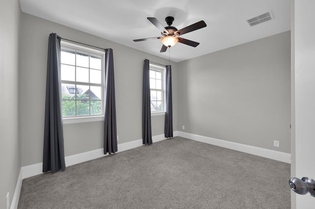 18618 Bridle Grove Ct, Tomball, TX 77377 - unfurnished room featuring healthy amount of natural light, carpet flooring, and ceiling fan