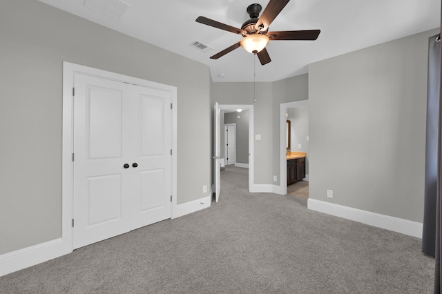 18618 Bridle Grove Ct, Tomball, TX 77377 - unfurnished bedroom with light carpet, ensuite bathroom, a closet, and a ceiling fan
