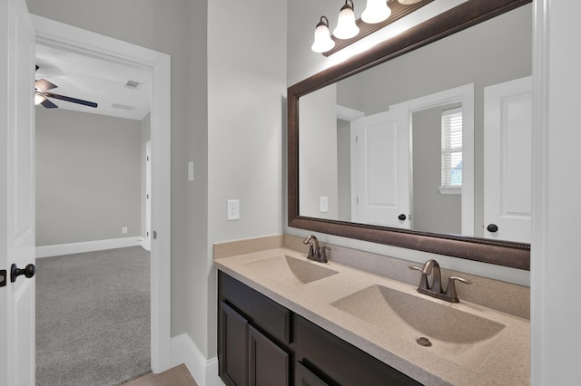 18618 Bridle Grove Ct, Tomball, TX 77377 - bathroom featuring double vanity and a ceiling fan