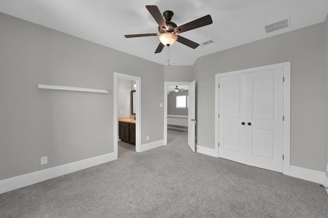 18618 Bridle Grove Ct, Tomball, TX 77377 - unfurnished bedroom with light colored carpet, a closet, ceiling fan, and ensuite bathroom