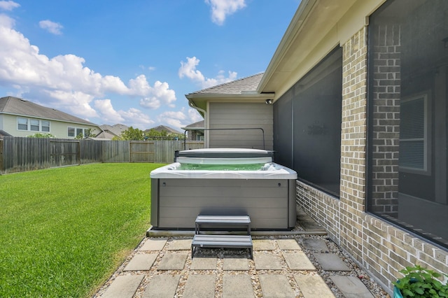 18618 Bridle Grove Ct, Tomball, TX 77377 - fenced backyard with a hot tub and a patio