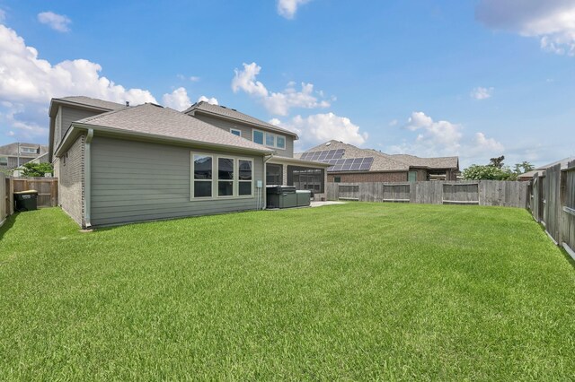 18618 Bridle Grove Ct, Tomball, TX 77377 - back of property featuring a hot tub and a fenced backyard