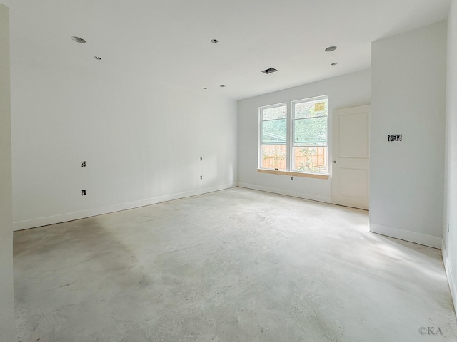 10651 Mayfield Rd, Houston, TX 77043 - spare room with concrete floors and baseboards