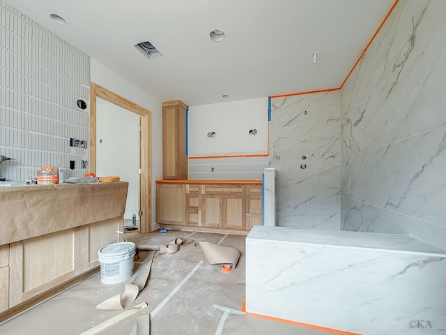 10651 Mayfield Rd, Houston, TX 77043 - full bath featuring vanity and tile walls