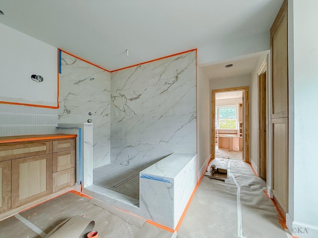 10651 Mayfield Rd, Houston, TX 77043 - full bath featuring a marble finish shower and vanity