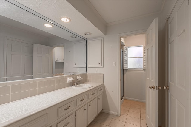 3799 Summer Ln, Huntsville, TX 77340 - full bath with vanity, tasteful backsplash, crown molding, tile patterned floors, and recessed lighting