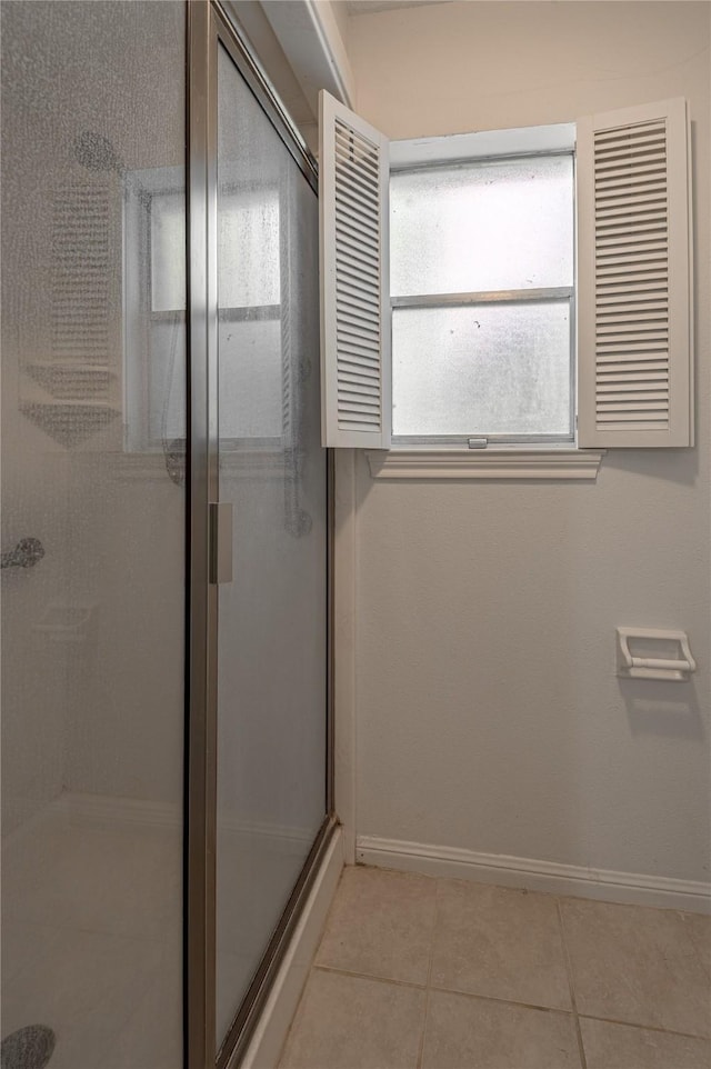 3799 Summer Ln, Huntsville, TX 77340 - bathroom featuring a shower stall and tile patterned floors