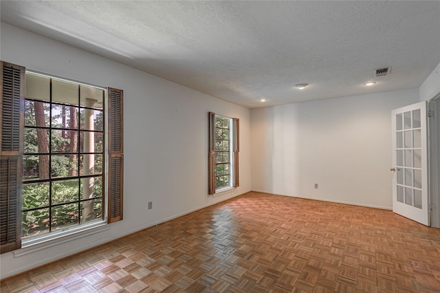 3799 Summer Ln, Huntsville, TX 77340 - spare room with a textured ceiling
