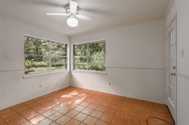 3799 Summer Ln, Huntsville, TX 77340 - empty room with healthy amount of natural light, crown molding, a ceiling fan, a textured ceiling, and light tile patterned flooring