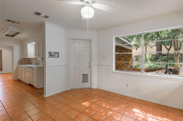 3799 Summer Ln, Huntsville, TX 77340 - empty room featuring light tile patterned flooring, ceiling fan, and ornamental molding