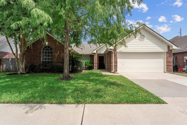 14306 Cypress Meadow Dr, Cypress, TX 77429 - view of front of house with brick siding, concrete driveway, an attached garage, and a front yard