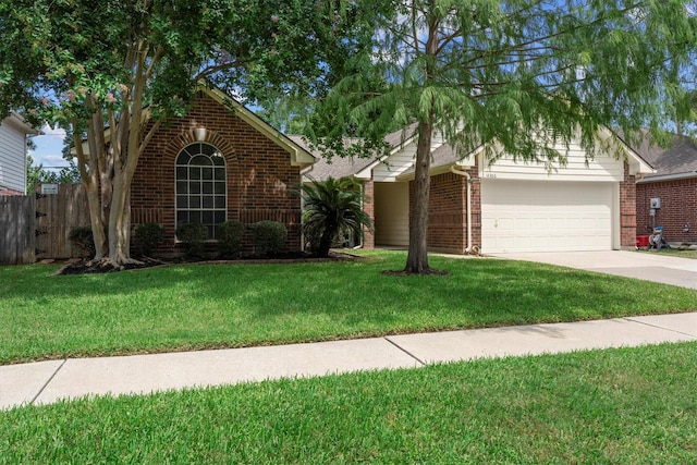 14306 Cypress Meadow Dr, Cypress, TX 77429 - view of front of property featuring brick siding, a garage, and concrete driveway