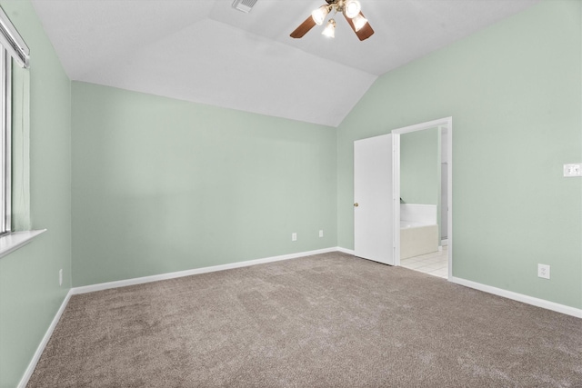 14306 Cypress Meadow Dr, Cypress, TX 77429 - unfurnished bedroom with carpet, lofted ceiling, ensuite bathroom, and a ceiling fan