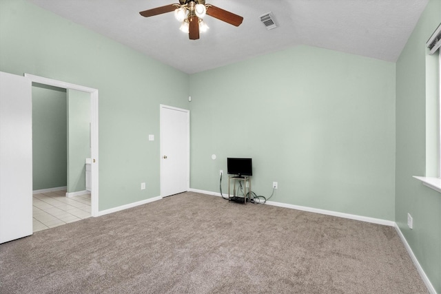 14306 Cypress Meadow Dr, Cypress, TX 77429 - carpeted empty room featuring a ceiling fan and vaulted ceiling
