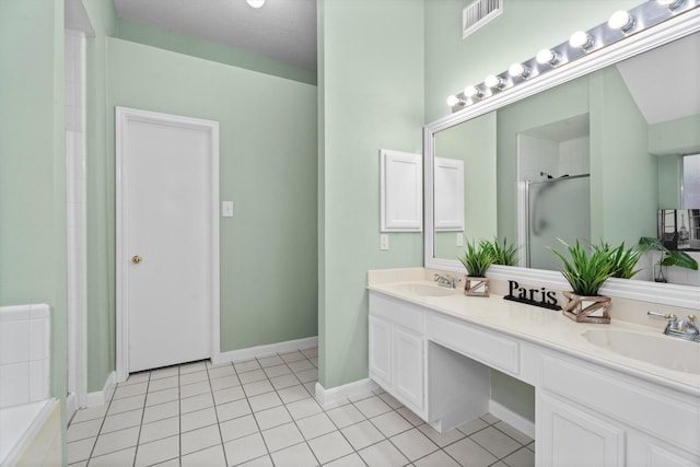 14306 Cypress Meadow Dr, Cypress, TX 77429 - bathroom featuring double vanity, a shower stall, and tile patterned floors