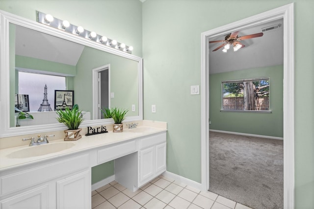 14306 Cypress Meadow Dr, Cypress, TX 77429 - bathroom with ceiling fan, double vanity, tile patterned floors, and lofted ceiling