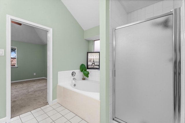 14306 Cypress Meadow Dr, Cypress, TX 77429 - bathroom featuring a stall shower, a bath, tile patterned floors, healthy amount of natural light, and vaulted ceiling